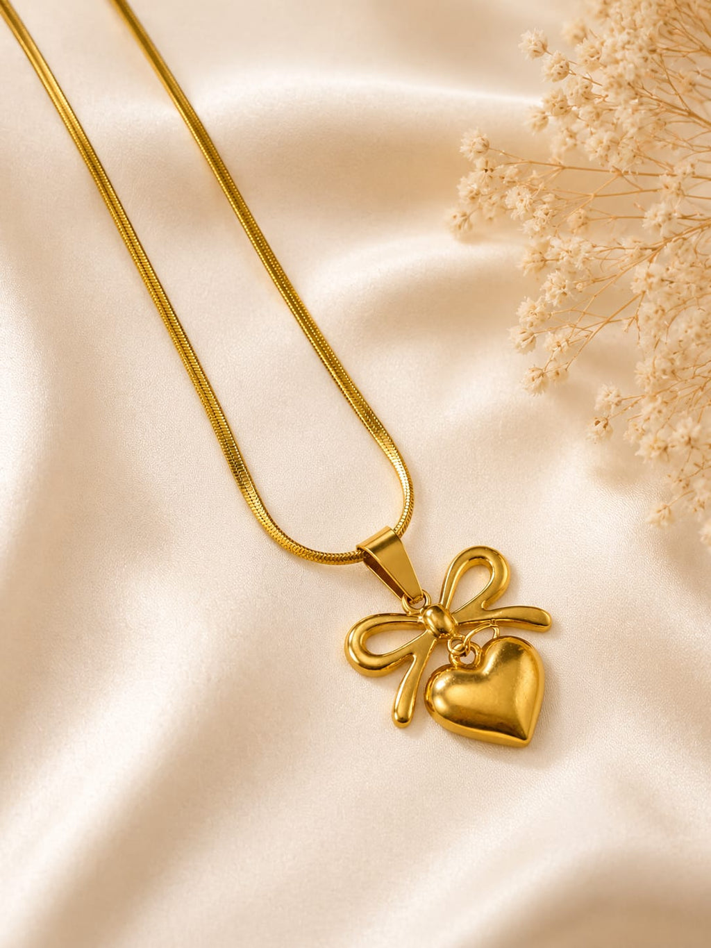 Gold-Finished Bow and Heart Pendant Necklace